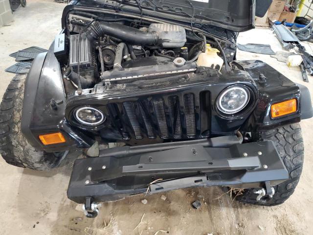 Photo 11 VIN: 1J4FY29P5XP407483 - JEEP WRANGLER 