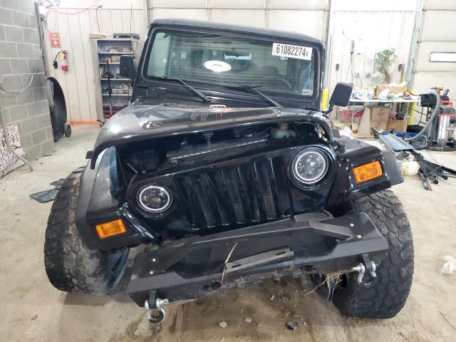 Photo 4 VIN: 1J4FY29P5XP407483 - JEEP WRANGLER 