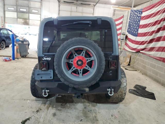 Photo 5 VIN: 1J4FY29P5XP407483 - JEEP WRANGLER 