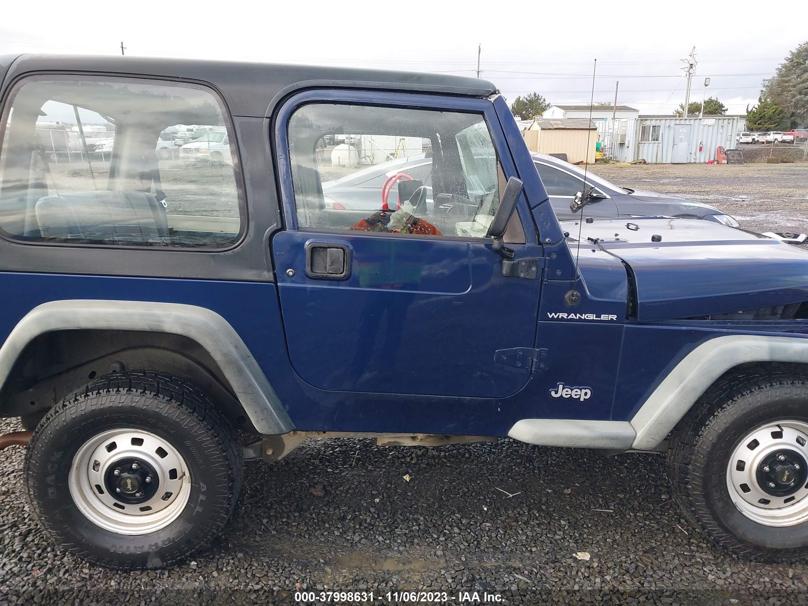 Photo 12 VIN: 1J4FY29P6VP500722 - JEEP WRANGLER 