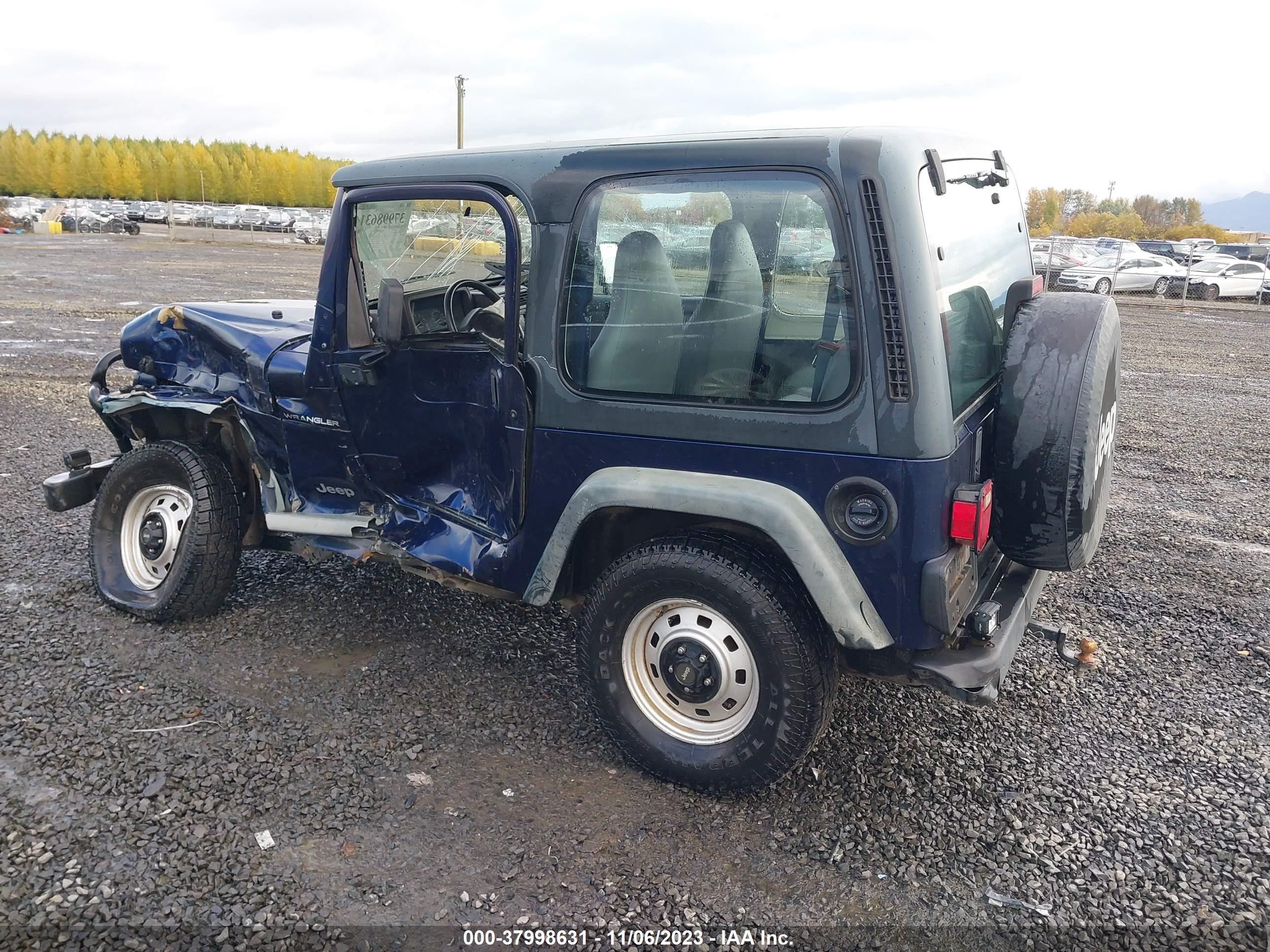 Photo 2 VIN: 1J4FY29P6VP500722 - JEEP WRANGLER 