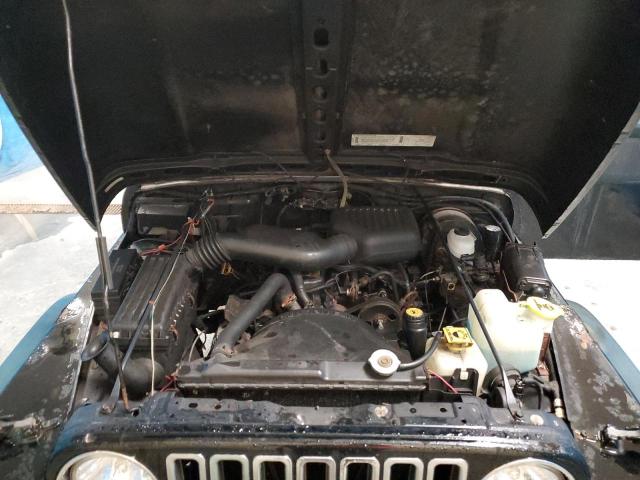 Photo 11 VIN: 1J4FY29P7WP742971 - JEEP WRANGLER 