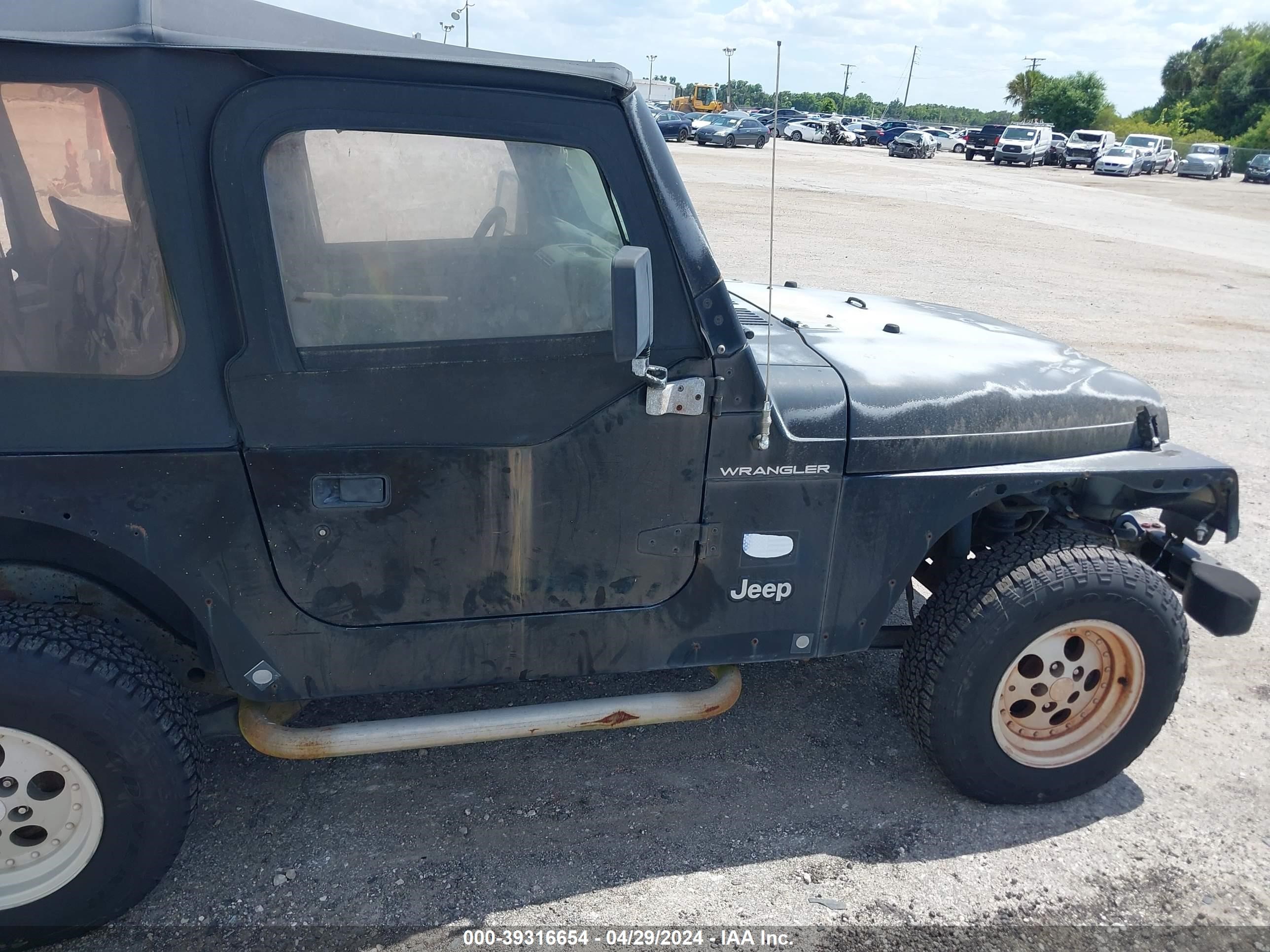 Photo 13 VIN: 1J4FY29P9VP521872 - JEEP WRANGLER 