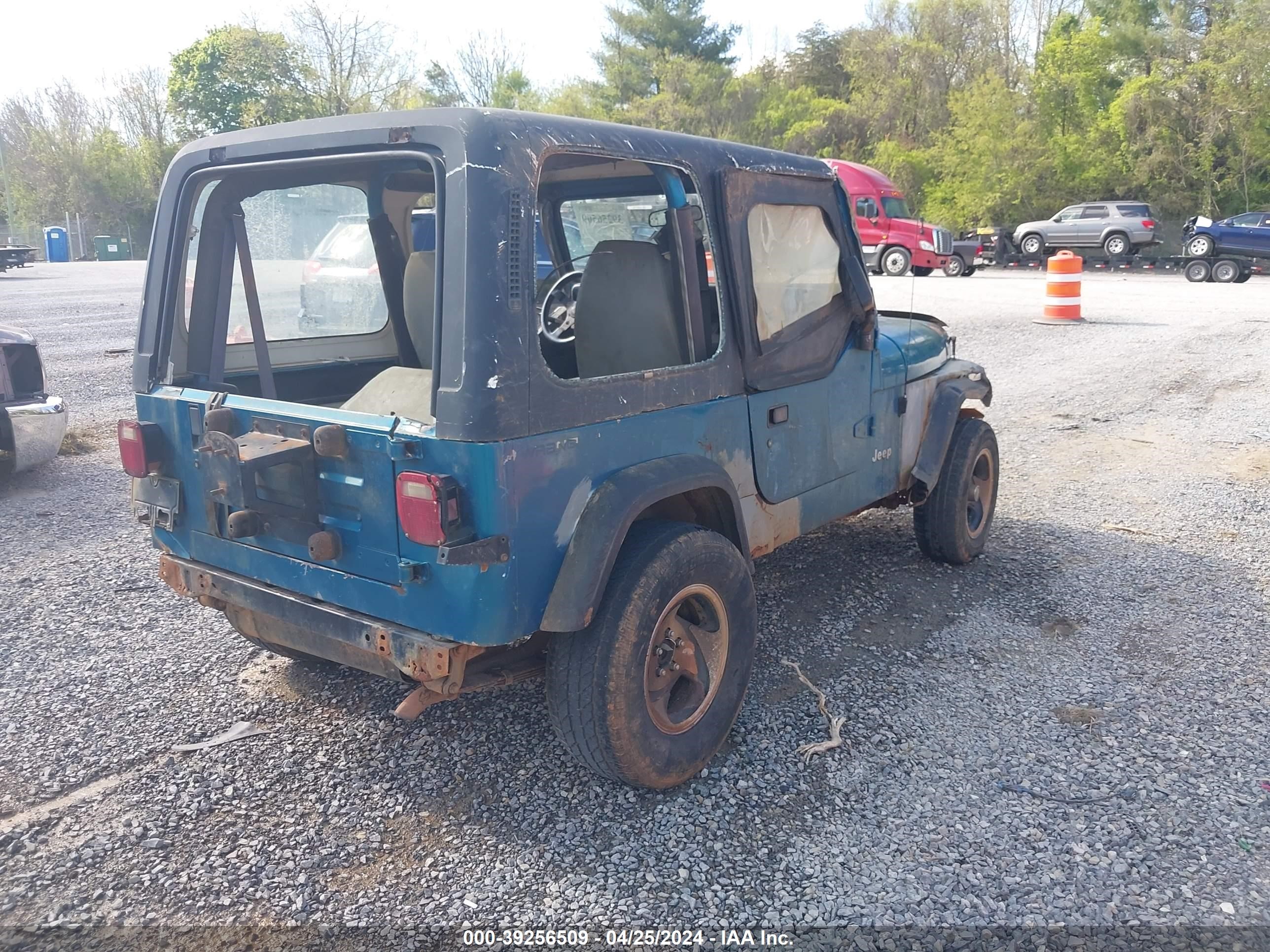 Photo 3 VIN: 1J4FY29S2RP427178 - JEEP WRANGLER 