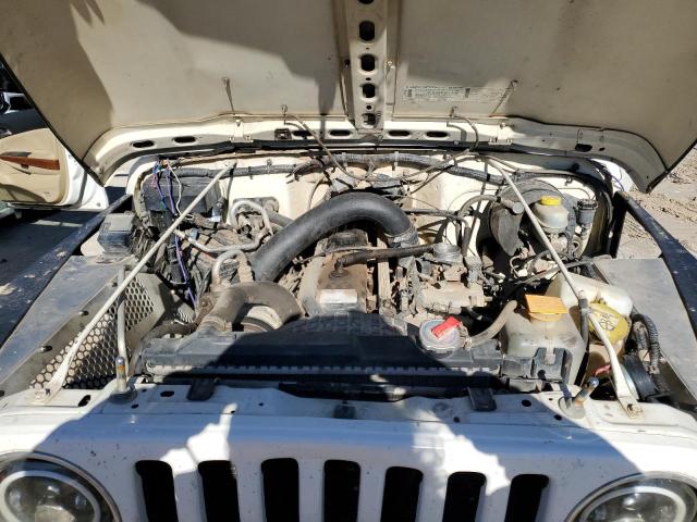 Photo 10 VIN: 1J4FY49S1XP401308 - JEEP WRANGLER 