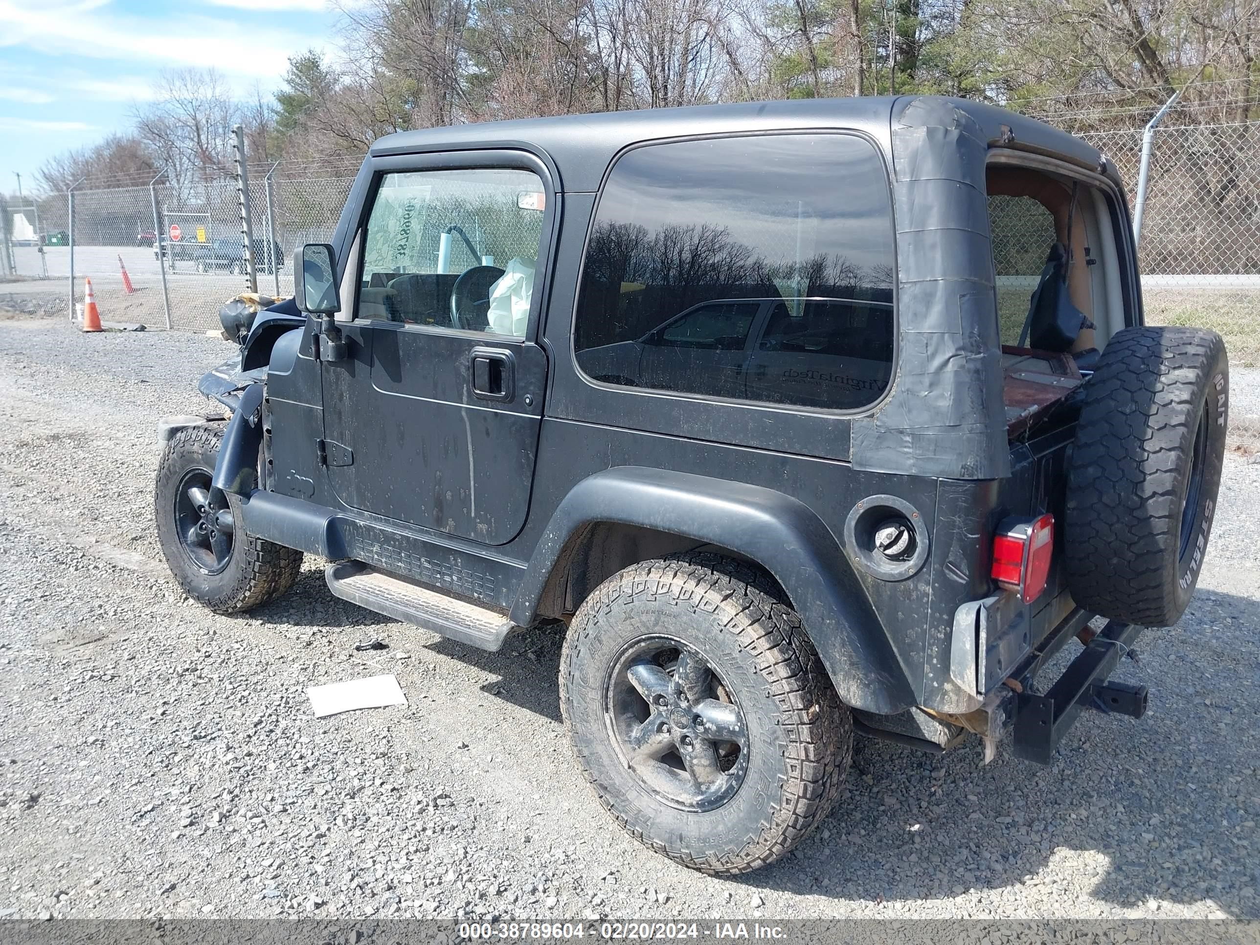 Photo 2 VIN: 1J4FY49S2VP470005 - JEEP WRANGLER 