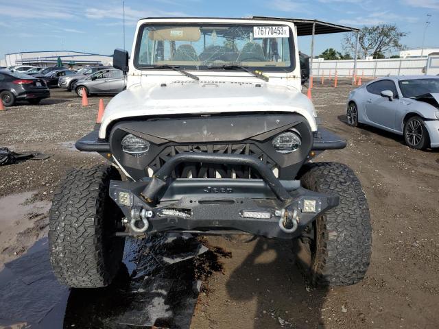 Photo 4 VIN: 1J4FY49S3VP518773 - JEEP WRANGLER 