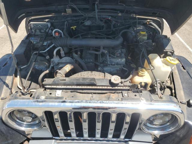 Photo 11 VIN: 1J4FY49S4XP424467 - JEEP WRANGLER 