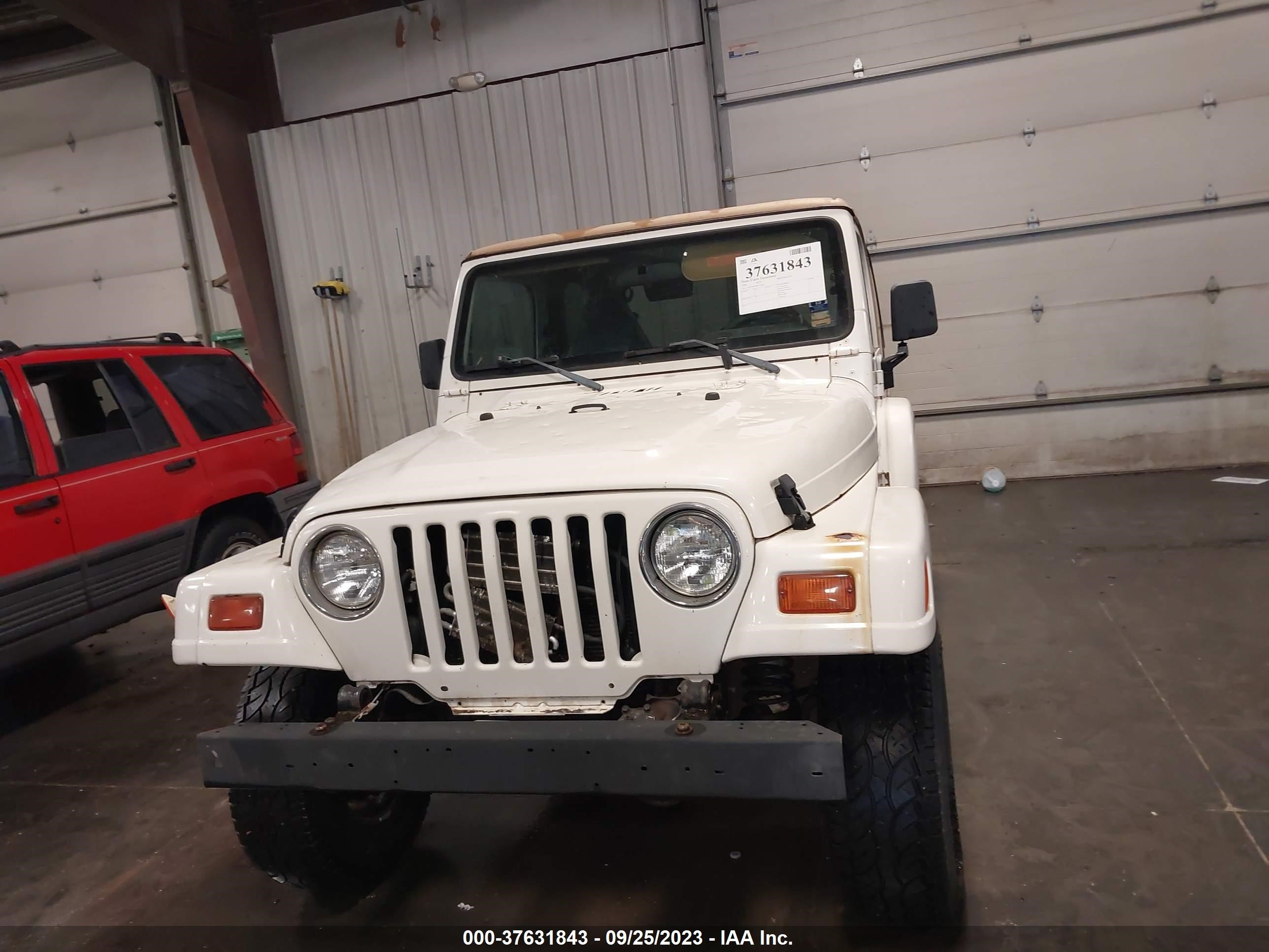 Photo 11 VIN: 1J4FY49S7WP729296 - JEEP WRANGLER 