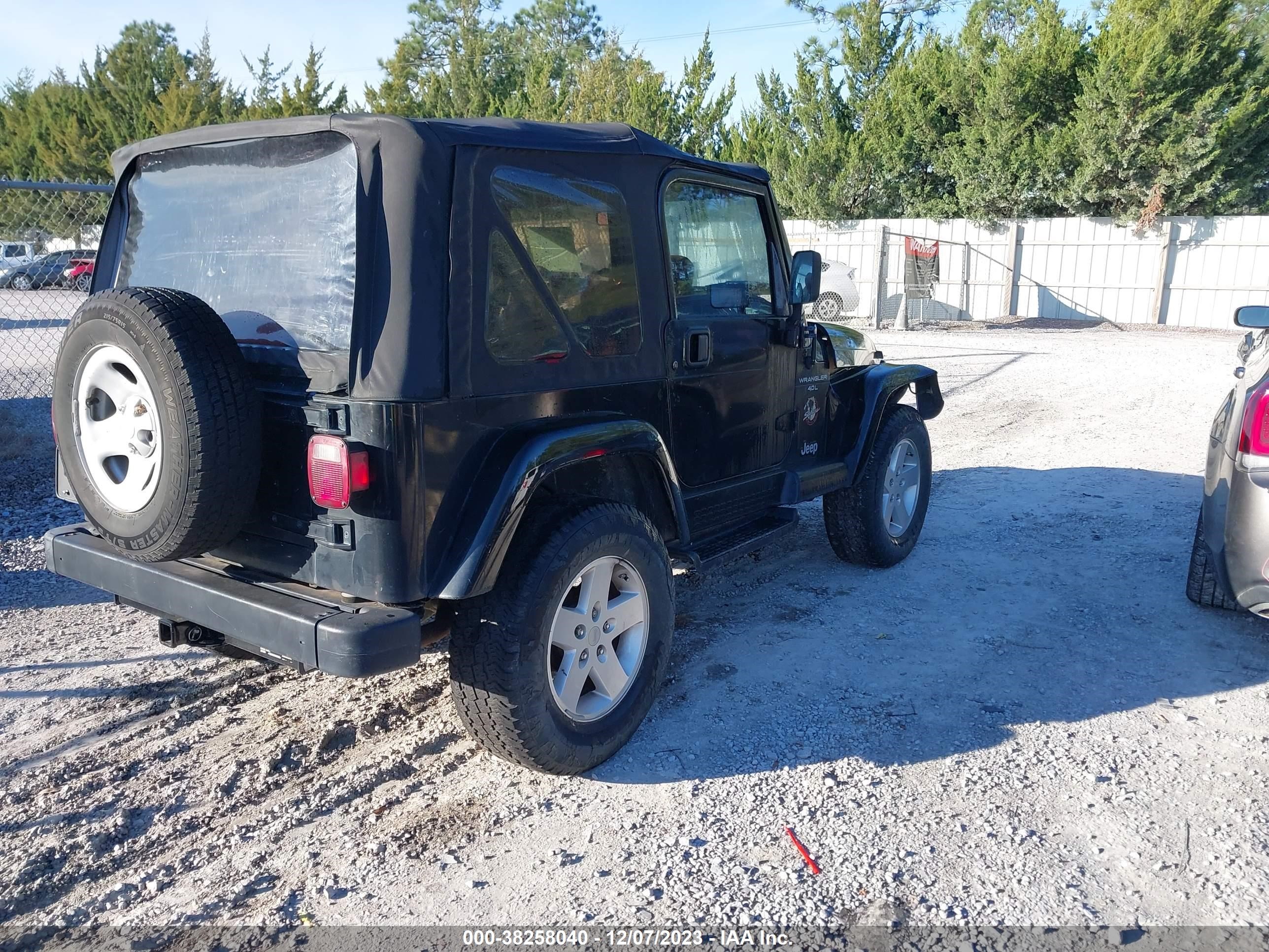 Photo 3 VIN: 1J4FY49S8XP490780 - JEEP WRANGLER 