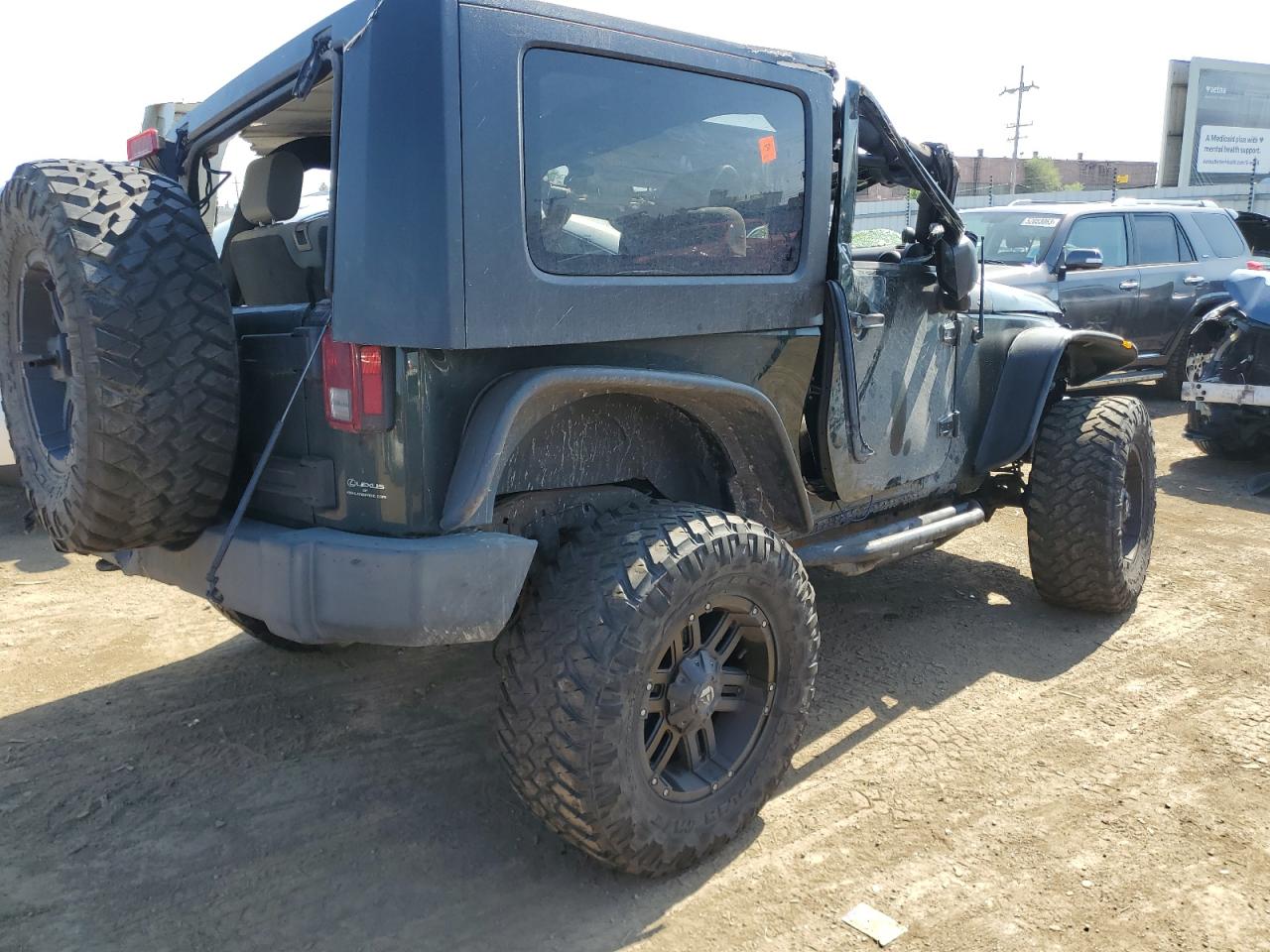 Photo 2 VIN: 1J4GA2D11AL128008 - JEEP WRANGLER 