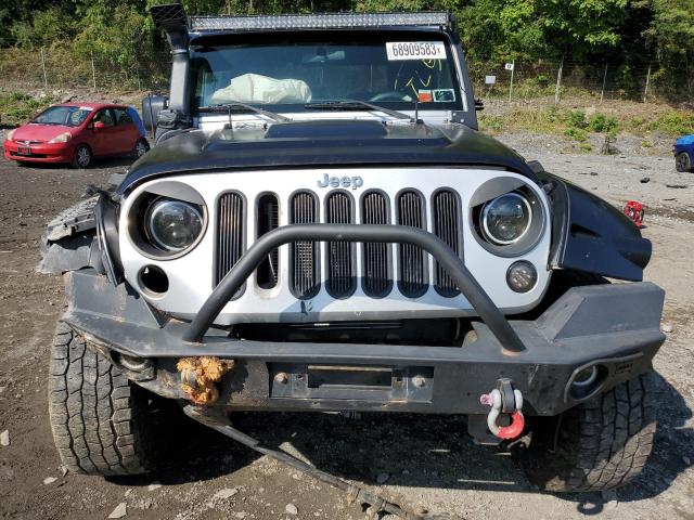 Photo 4 VIN: 1J4GA2D11BL602346 - JEEP WRANGLER S 