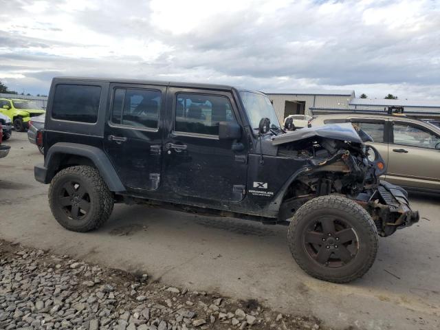 Photo 3 VIN: 1J4GA39118L558923 - JEEP WRANGLER U 