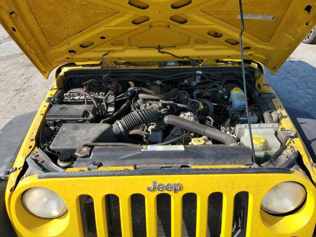 Photo 11 VIN: 1J4GA39138L593138 - JEEP WRANGLER 