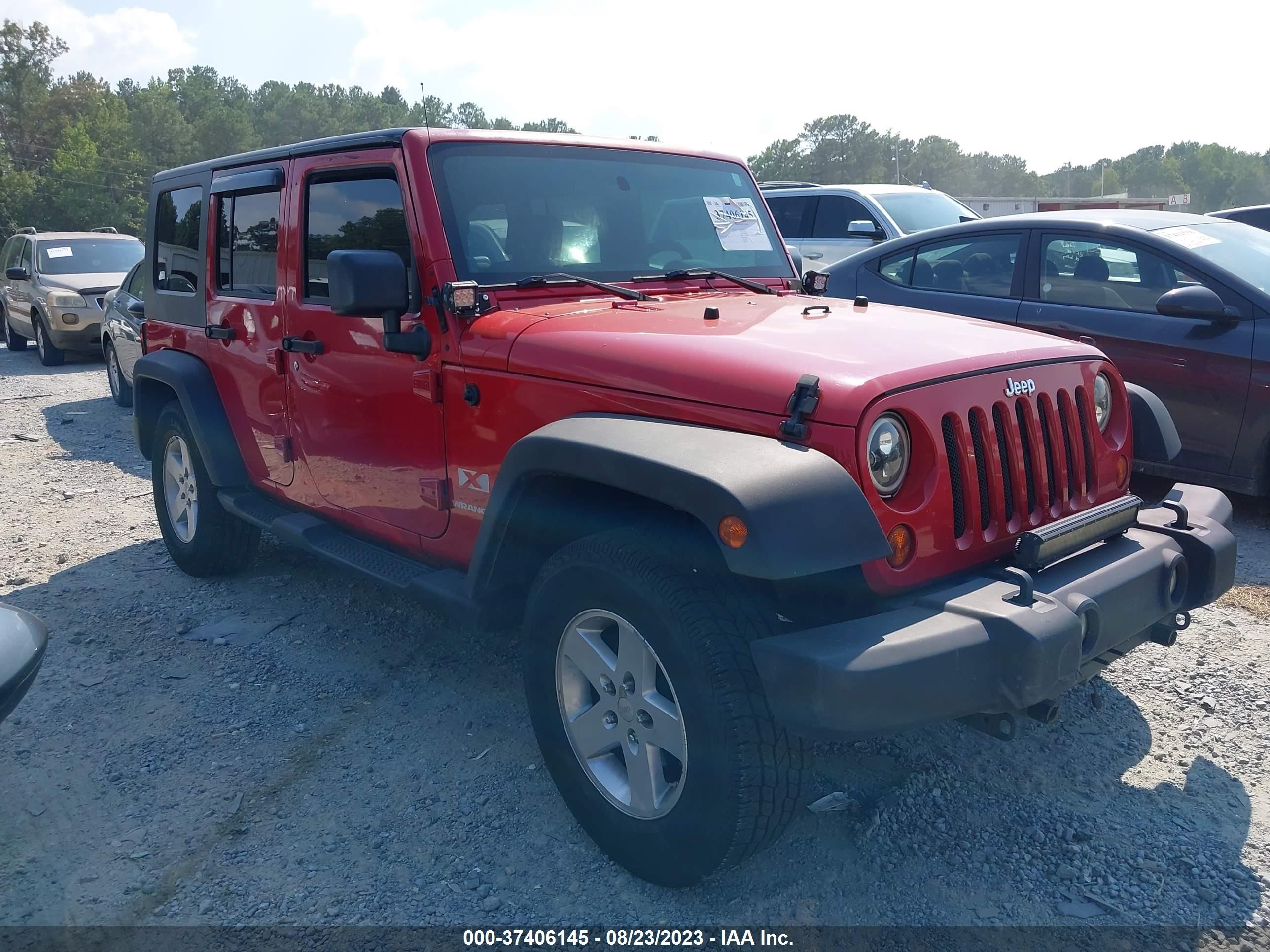 Photo 12 VIN: 1J4GA39139L760342 - JEEP WRANGLER 