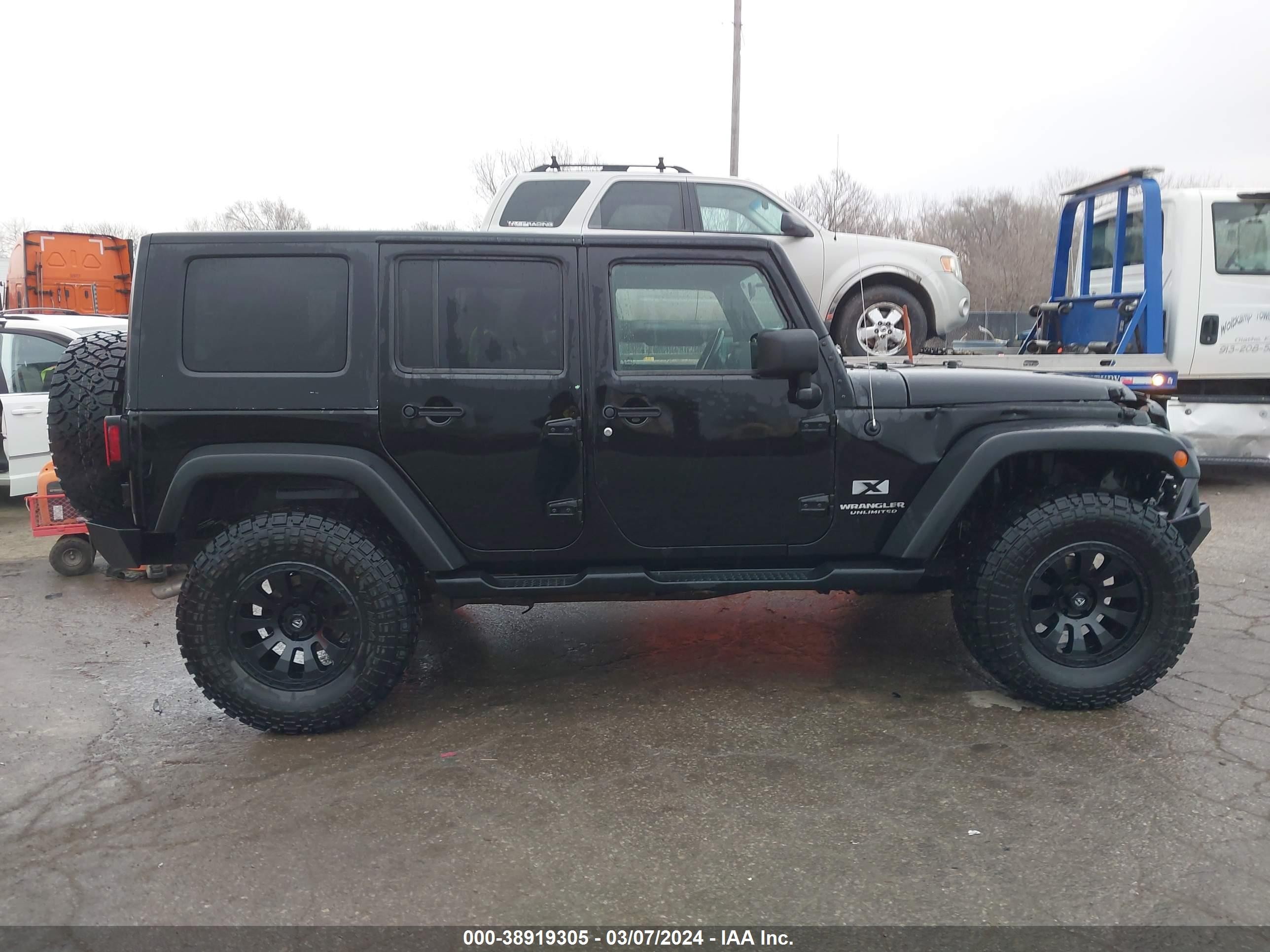 Photo 12 VIN: 1J4GA39148L574419 - JEEP WRANGLER 