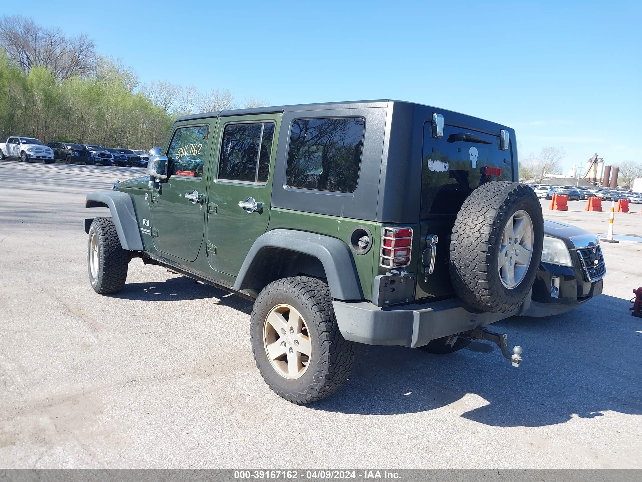 Photo 2 VIN: 1J4GA39158L509045 - JEEP WRANGLER 