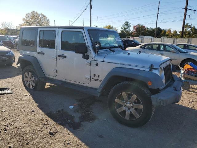 Photo 3 VIN: 1J4GA391X9L710148 - JEEP WRANGLER U 