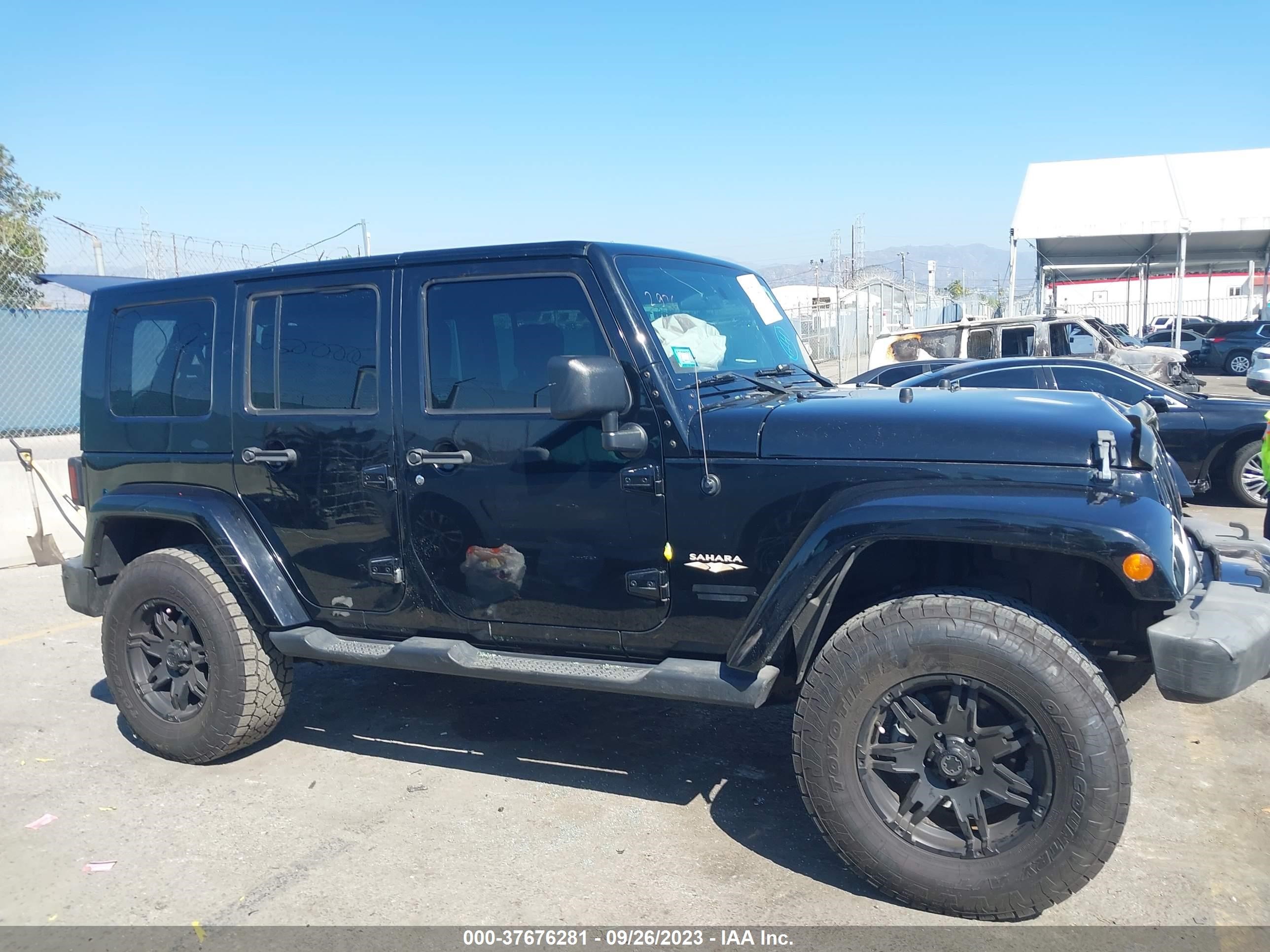 Photo 12 VIN: 1J4GA591X8L638300 - JEEP WRANGLER 