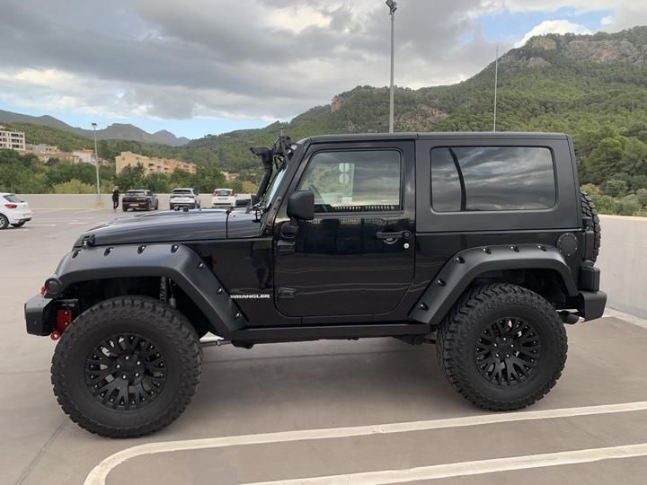 Photo 9 VIN: 1J4GAC49X7L146334 - JEEP WRANGLER 4X4 (FOUR WHEEL DRIVE). 