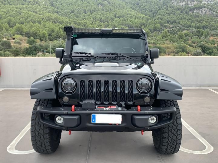 Photo 3 VIN: 1J4GAC49X7L146334 - JEEP WRANGLER 4X4 (FOUR WHEEL DRIVE). 