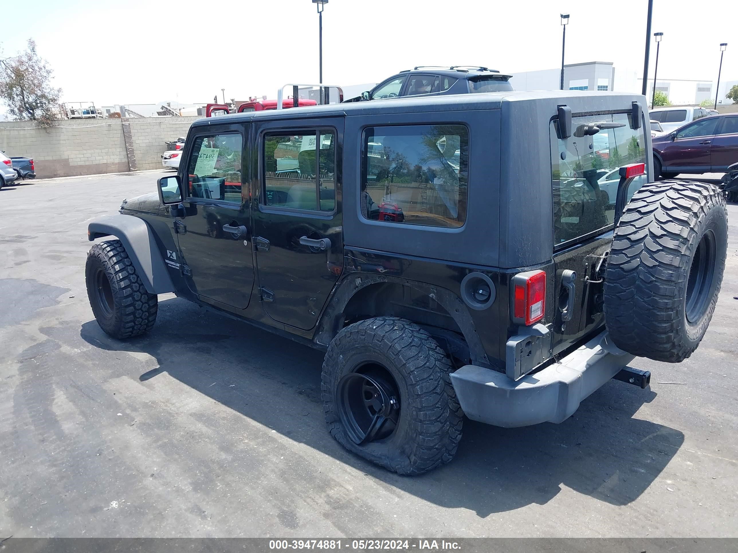 Photo 2 VIN: 1J4GB39109L723634 - JEEP WRANGLER 