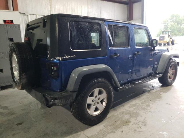 Photo 2 VIN: 1J4GB39179L731200 - JEEP WRANGLER 