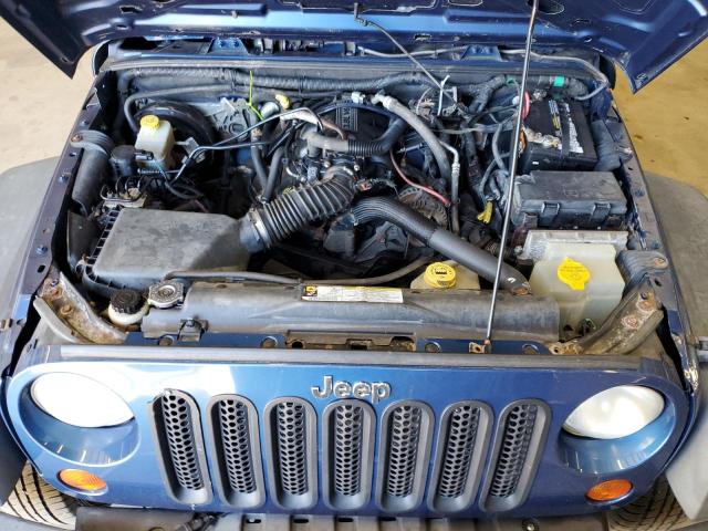 Photo 11 VIN: 1J4GZ39159L713502 - JEEP WRANGLER U 