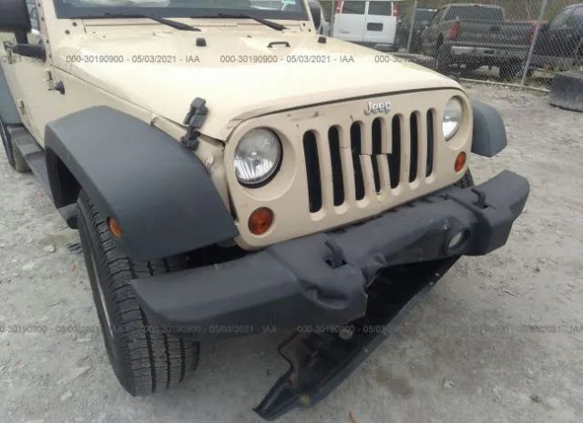 Photo 5 VIN: 1J4HA3H11BL569790 - JEEP WRANGLER UNLIMITED 