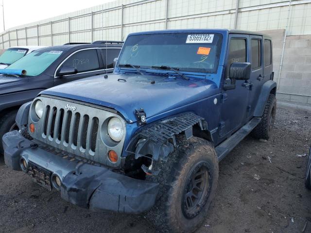 Photo 1 VIN: 1J4HA3H13AL195553 - JEEP WRANGLER U 