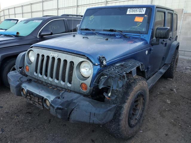 Photo 8 VIN: 1J4HA3H13AL195553 - JEEP WRANGLER U 