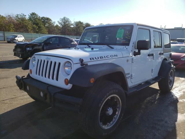 Photo 1 VIN: 1J4HA3H14BL590102 - JEEP WRANGLER U 