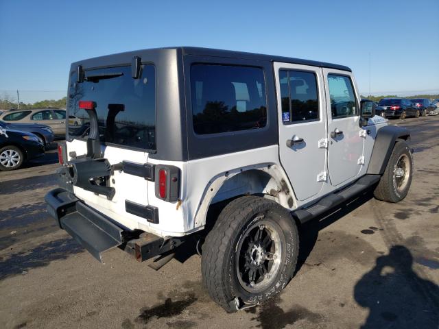 Photo 3 VIN: 1J4HA3H14BL590102 - JEEP WRANGLER U 