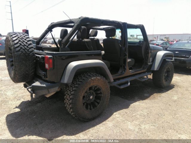 Photo 3 VIN: 1J4HA3H14BL598622 - JEEP WRANGLER UNLIMITED 