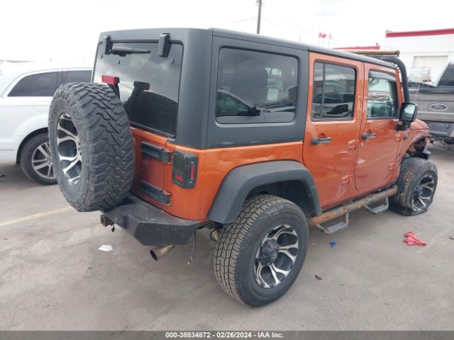 Photo 3 VIN: 1J4HA3H17BL508122 - JEEP WRANGLER UNLIMITED 