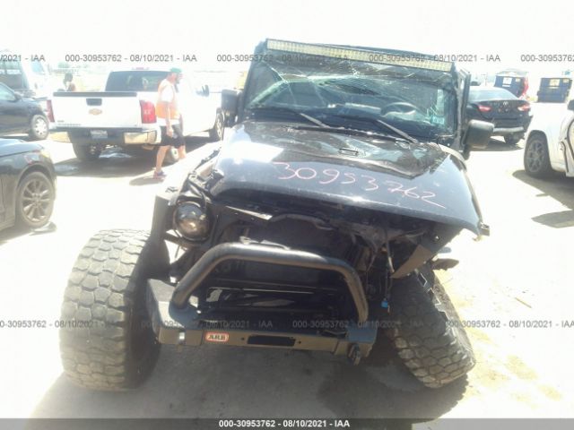 Photo 5 VIN: 1J4HA3H19AL132988 - JEEP WRANGLER UNLIMITED 