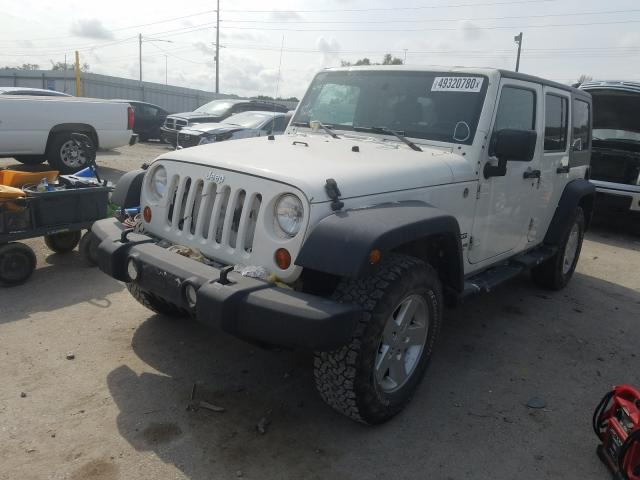 Photo 1 VIN: 1J4HA3H19AL140847 - JEEP WRANGLER U 