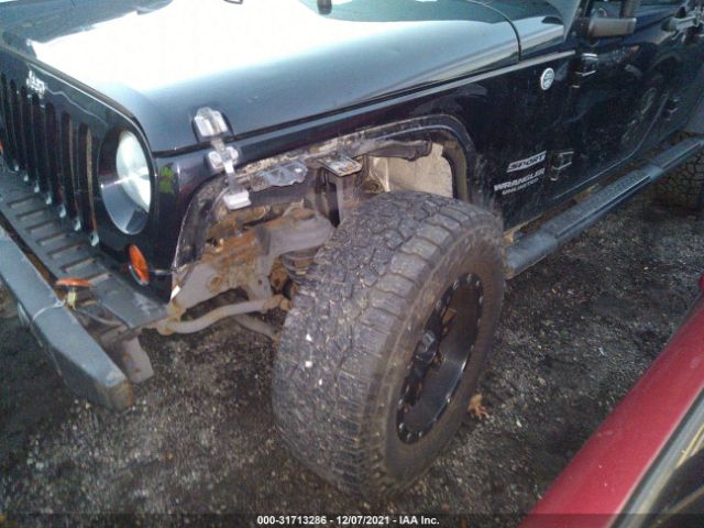 Photo 5 VIN: 1J4HA3H19BL539596 - JEEP WRANGLER UNLIMITED 