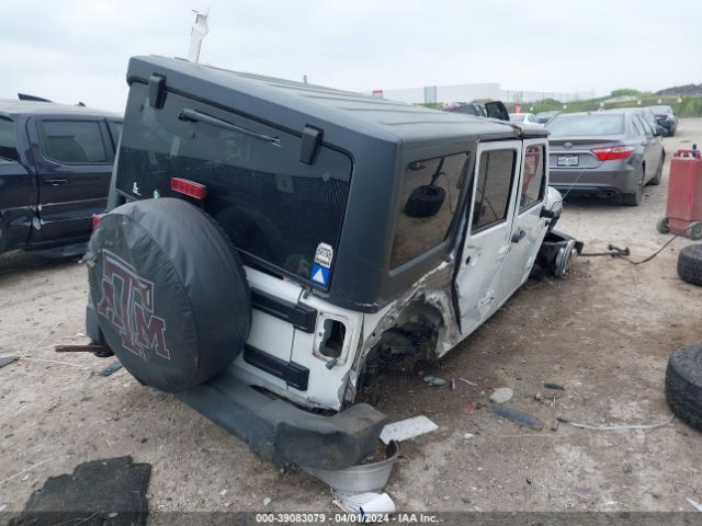 Photo 3 VIN: 1J4HA3H19BL626348 - JEEP WRANGLER UNLIMITED 