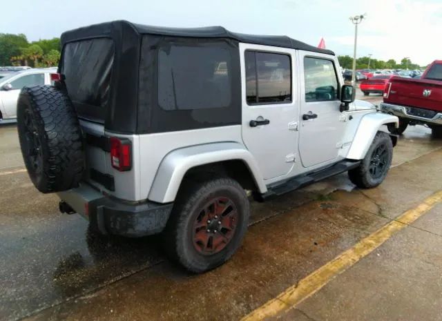 Photo 3 VIN: 1J4HA5H10AL115427 - JEEP WRANGLER UNLIMITED 