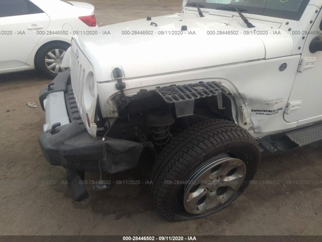 Photo 5 VIN: 1J4HA5H10AL169049 - JEEP WRANGLER UNLIMITED 