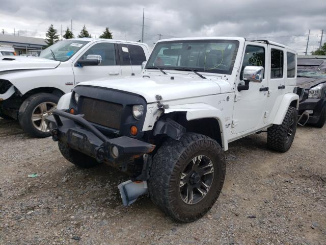 Photo 1 VIN: 1J4HA5H10BL562423 - JEEP WRANGLER U 