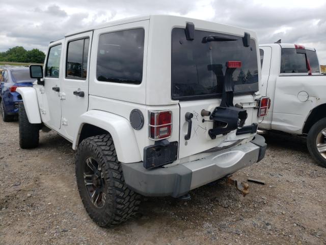 Photo 2 VIN: 1J4HA5H10BL562423 - JEEP WRANGLER U 