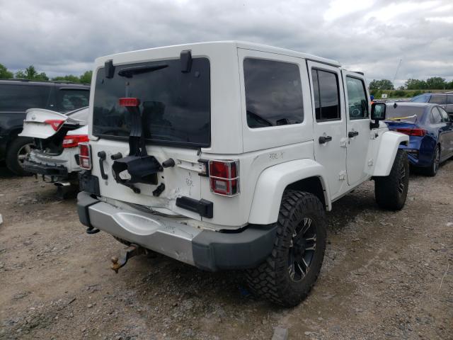 Photo 3 VIN: 1J4HA5H10BL562423 - JEEP WRANGLER U 