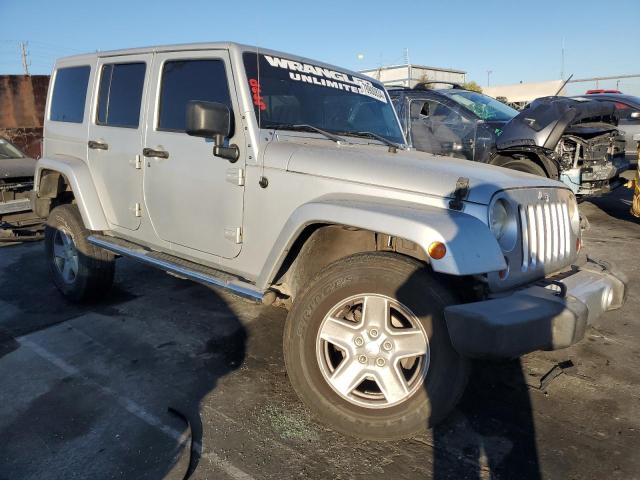 Photo 3 VIN: 1J4HA5H10BL617775 - JEEP WRANGLER U 