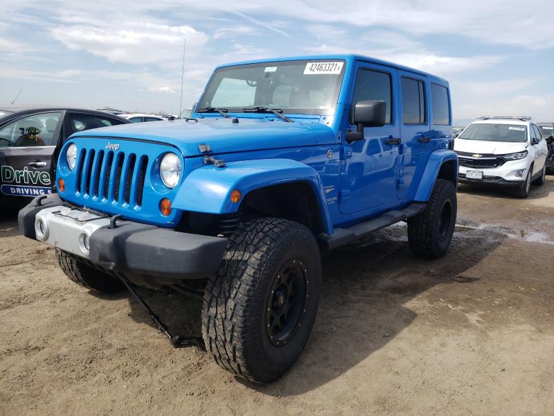 Photo 1 VIN: 1J4HA5H12BL570099 - JEEP WRANGLER U 