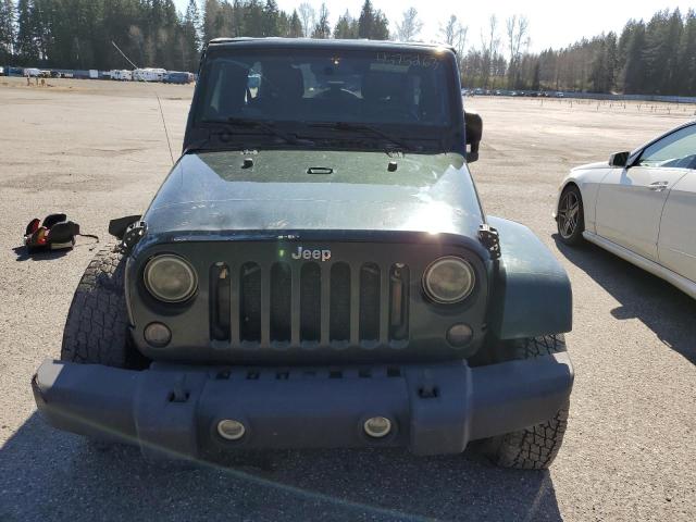 Photo 4 VIN: 1J4HA5H13BL567759 - JEEP WRANGLER U 