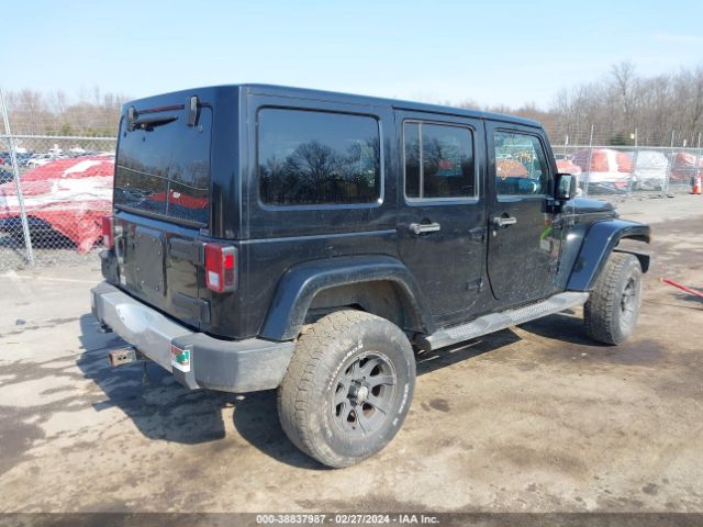 Photo 3 VIN: 1J4HA5H13BL617835 - JEEP WRANGLER UNLIMITED 