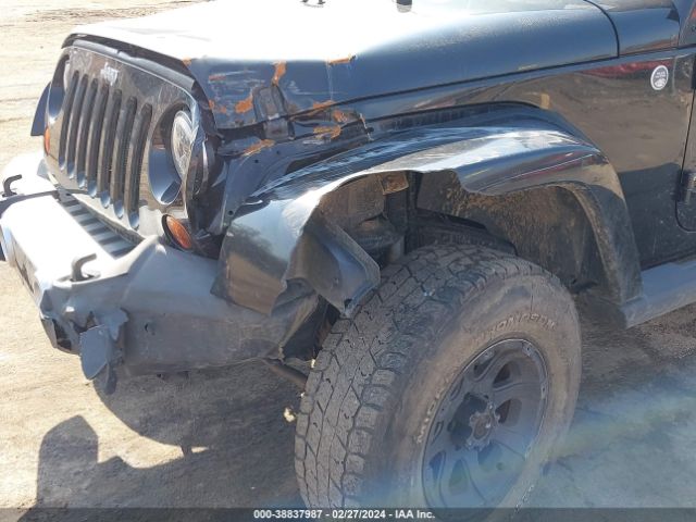 Photo 5 VIN: 1J4HA5H13BL617835 - JEEP WRANGLER UNLIMITED 