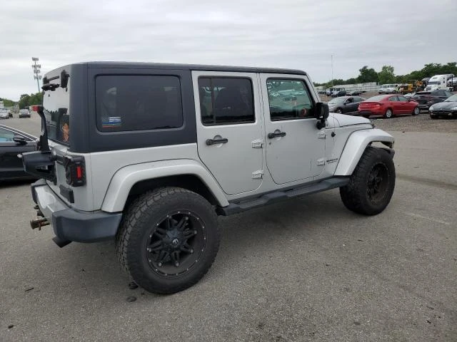 Photo 2 VIN: 1J4HA5H13BL632660 - JEEP WRANGLER U 